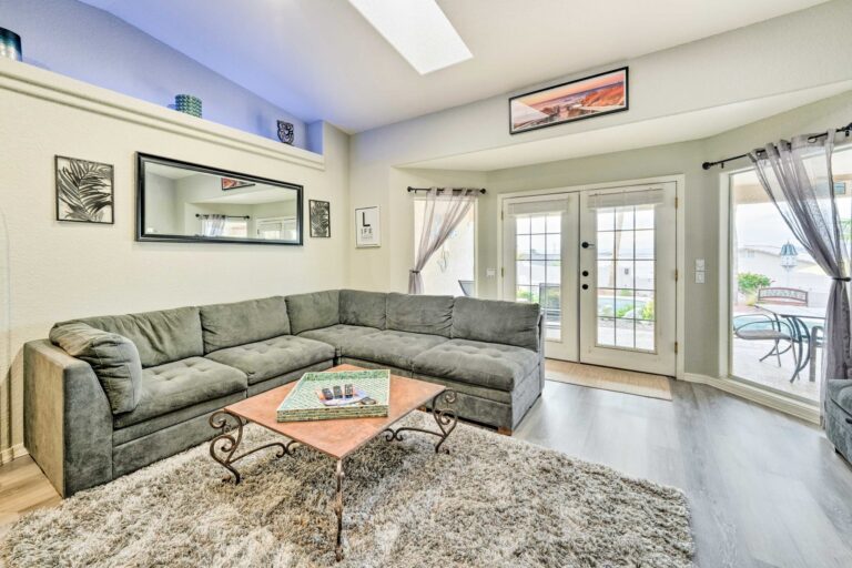 A living room with a couch and table